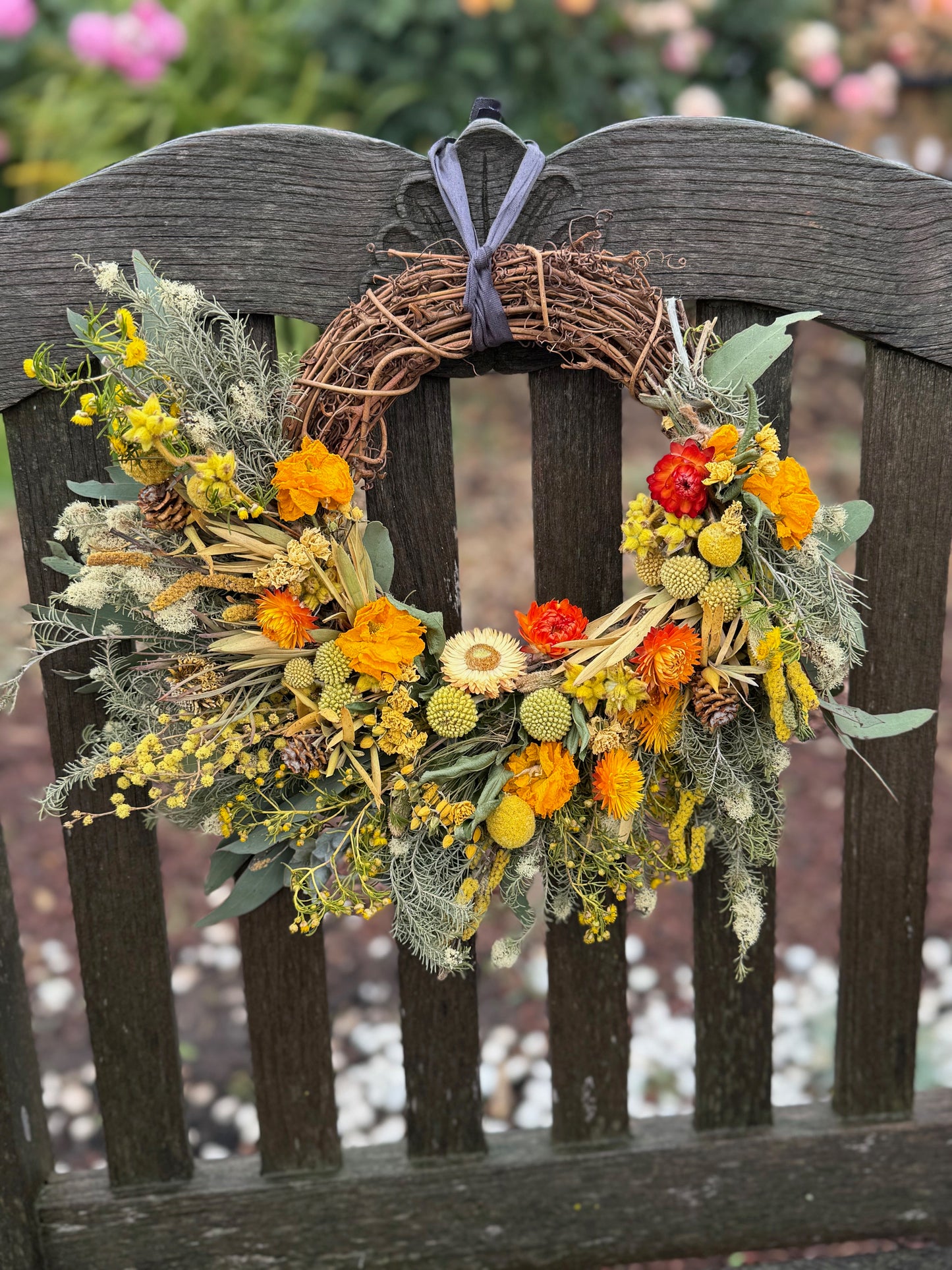 Decorative wreath with Australian native flowers and a yellow theme